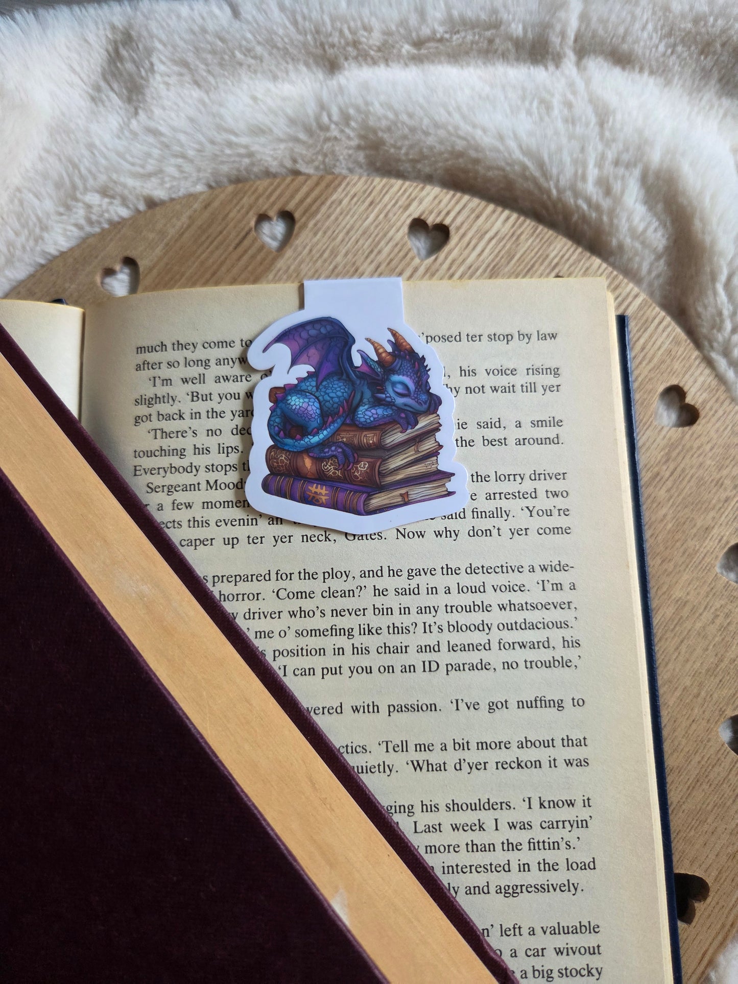 Magnetic bookmark, blue dragon sleeping on a stack of books