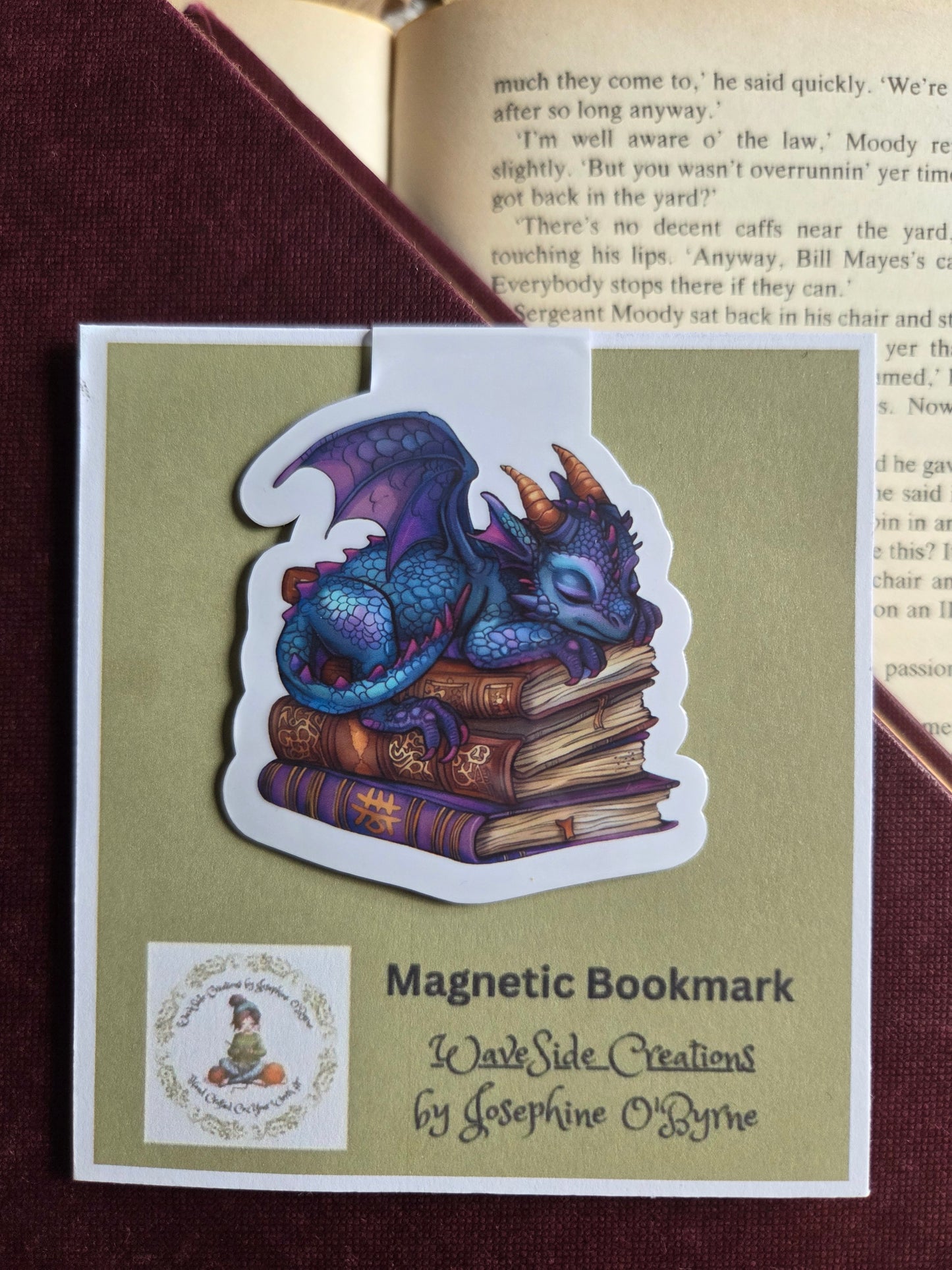 Magnetic bookmark, blue dragon sleeping on a stack of books